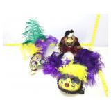 Ornate mardi gras style masks and fancy cat in