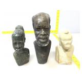 African styled carved busts. One is marked made
