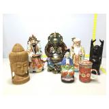 Assorted collectible figures. Some damages.