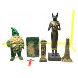 Assorted figures, candle holder and vase.