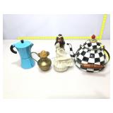 Teapots, pitcher and musical doll.