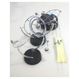 Perpetual motion stands. Some incomplete.