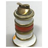 6 in tall table lighter. Marked made in Italy.