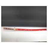 Decorative Sword in Red sheath.