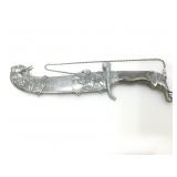 Ornate fantasy knife with metal sheath.