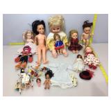 Collection of sleepy eye dolls and more.