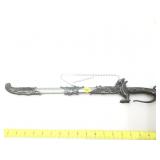 Dragon theme fantasy knife in metal sheath.