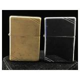 Pair of matching Zippo Lighters. One is chrome,