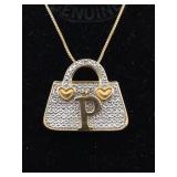 Sterling necklace with purse pendant. 16 in