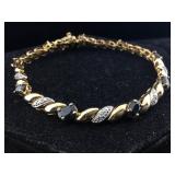 Sterling vermeil bracelet with topaz. 7 in