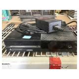 Xbox One with power cord Powers on; light does