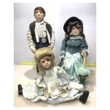 Three Handcrafted Porcelain Dolls.