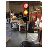 Vintage Traffic Signal Mounted on Metal Stand.