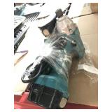 Makita Impact Drill with a batteries and charger