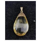 14K Gold gemstone pendant chipped