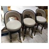 3 Michael Berman Swivel bar stools from high end