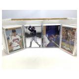 Mixed sports cards in cases