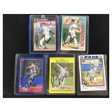 5 Greg maddux Autographed cards