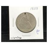 1858 Silver half dollar with hole