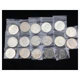 17- High grade IKE dollars some silver