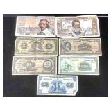 Bag of french german and mexican currency