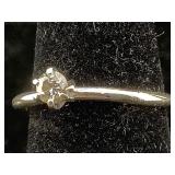 14K Gold ring .15diamond 2g sz7.5