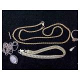 bag of costume jewelry some silver