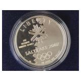 Silver commerative dollar in box