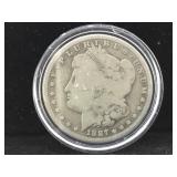 1887-O Morgan Silver Dollar in case