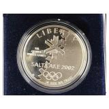 Silver commerative dollar in box Olympics 2002