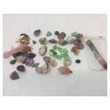 Collection of crystal and stone specimens.