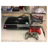 PS3 gaming system and assorted games. Untested