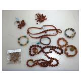 Assorted gemstone and bead jewelry.