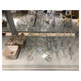 Assorted plates and glassware.