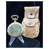 Pocket watch in leather pouch