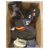 Box of assorted shoes.