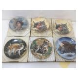 6 porcelain collectible plates.