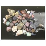 Collection of polished and raw  stones.