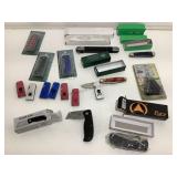Assorted NIB pocket knives and novelty items