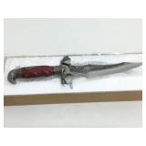 NIB ornate eagle theme knife. NIB ornate eagle theme knife.