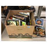 Box of assorted DVDs. Box of assorted DVDs.