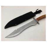 NIB hunting knife with fabric sheath. NIB hunting knife with fabric sheath.