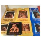 13 vintage Playmate desk and wall calendars will