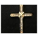 10k GOLD CROSS W/ .25 ctw diamonds , 2.5g