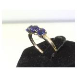 10k GOLD RING W/ dark blue gemstones, size 8.5,