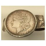 1889 Morgan silver dollar and Sterling Money