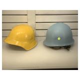 2 helmets, yellow, blue , Swiss afiremans ,and