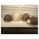 4 military helmets