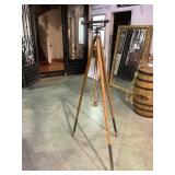 Vintage antique brass surveyors transit on oak