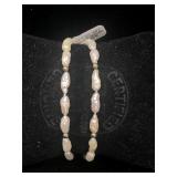 14k beads, clasp & dead pearl double strand